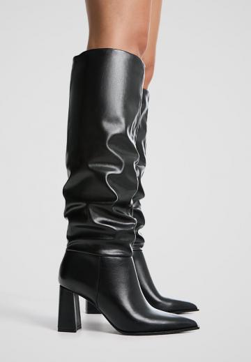 Высокие сапоги