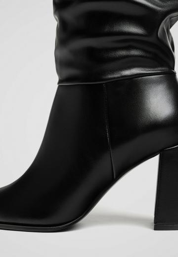 Высокие сапоги