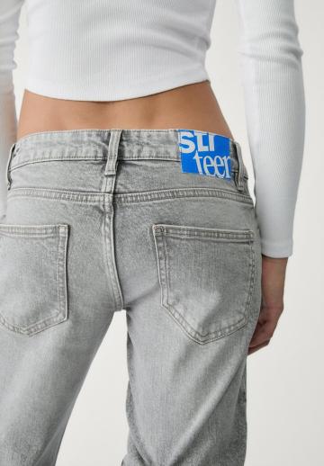 Клешеные джинсы