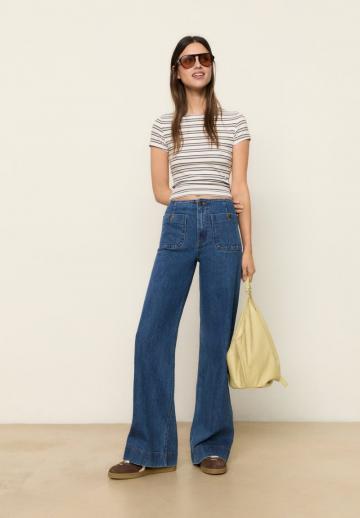 Клешеные джинсы