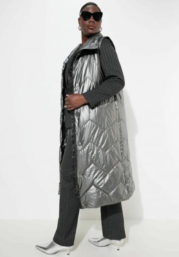 Длинный жилет