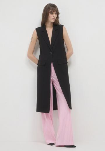 Длинный жилет