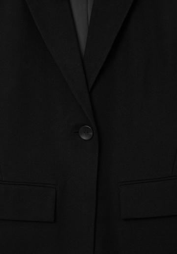 Длинный жилет