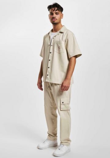 Брюки с накладными карманами