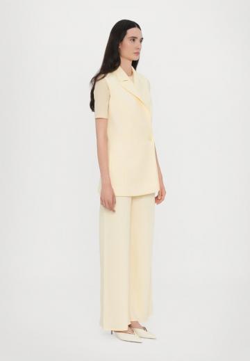 Длинный жилет