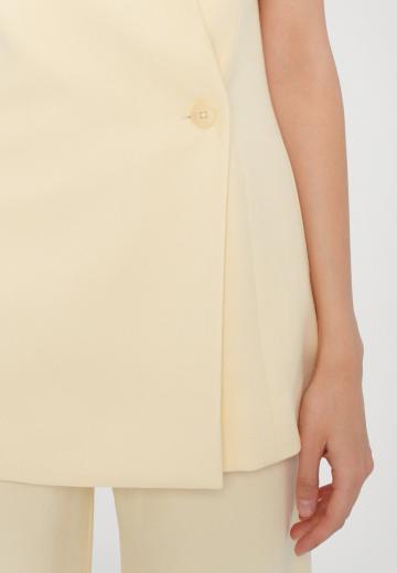 Длинный жилет