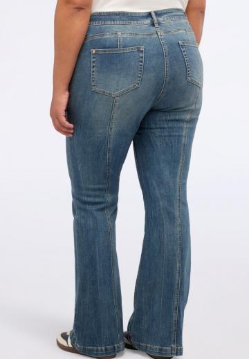 Клешеные джинсы