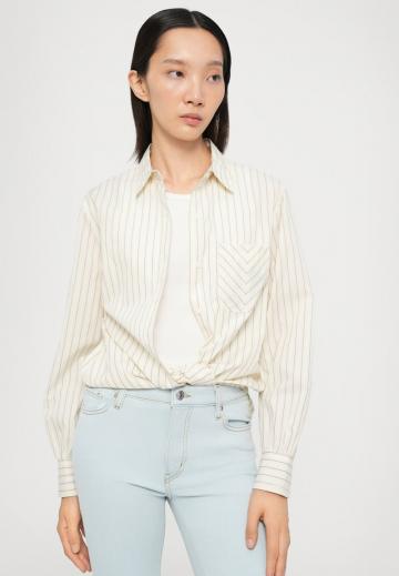 Клешеные джинсы