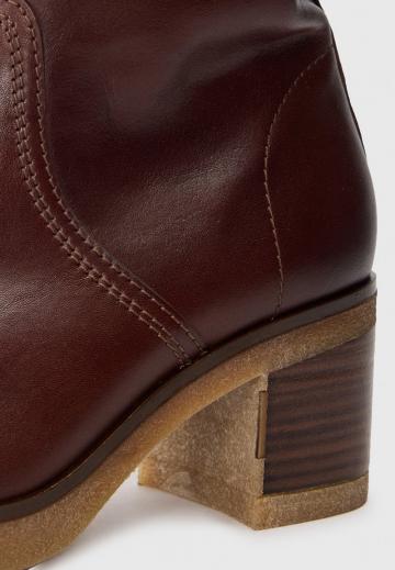 Высокие сапоги