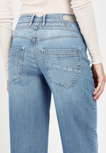 Клешеные джинсы