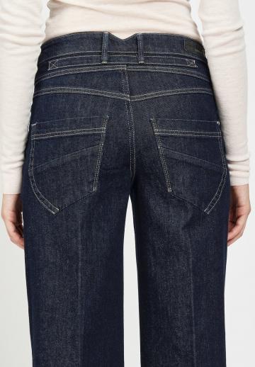 Клешеные джинсы