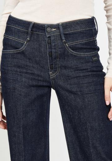 Клешеные джинсы