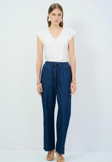 Клешеные джинсы