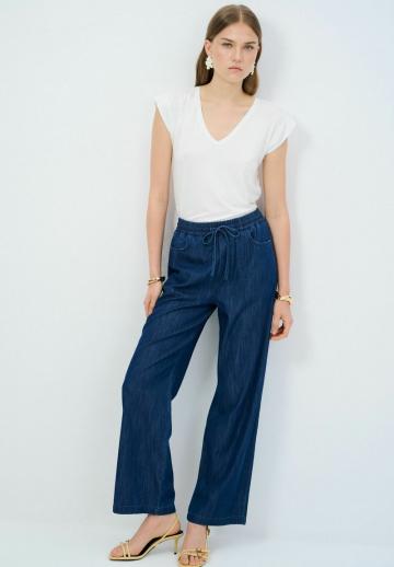 Клешеные джинсы