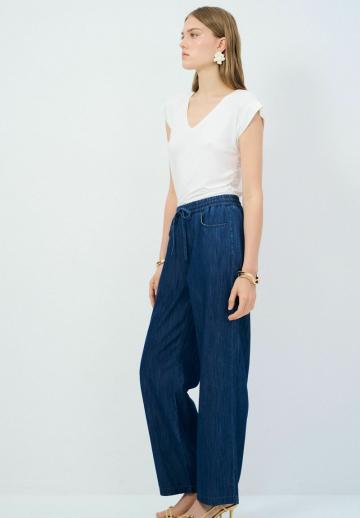 Клешеные джинсы