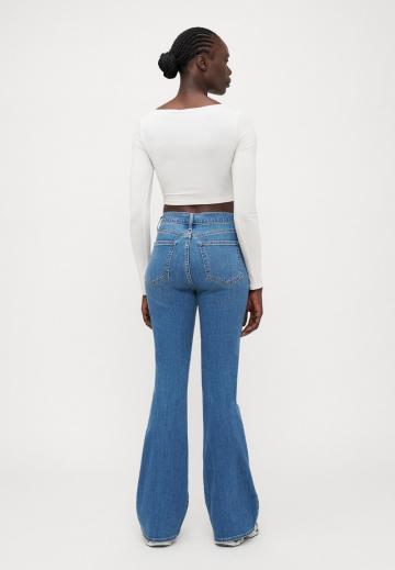 Клешеные джинсы