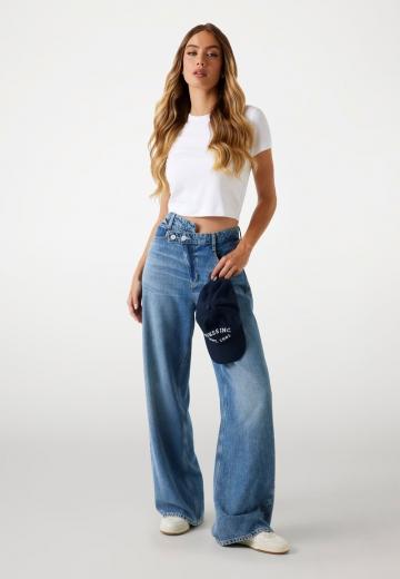 Клешеные джинсы