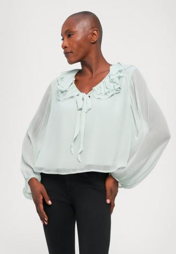 Клешеные джинсы