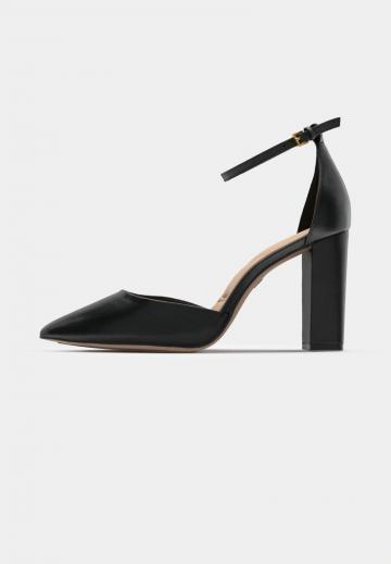 Туфли на высоком каблуке