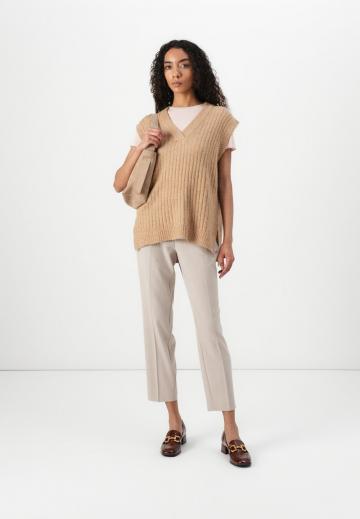 Длинный жилет