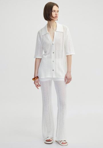 Длинный жилет