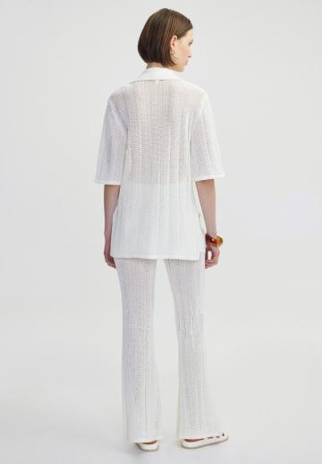 Длинный жилет