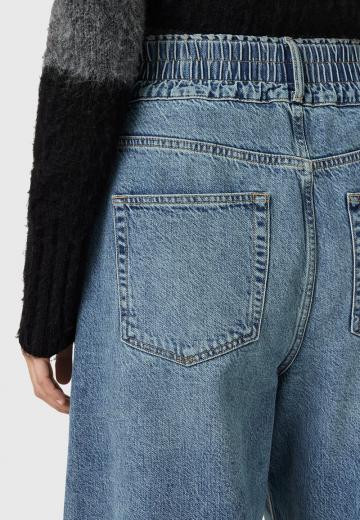 Клешеные джинсы