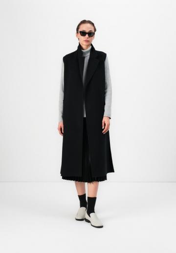 Длинный жилет