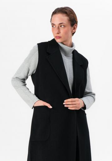 Длинный жилет