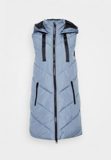 Длинный жилет