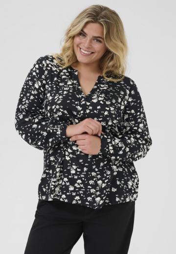 Длинная блузка