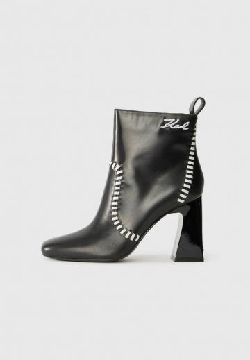 Высокие сапоги