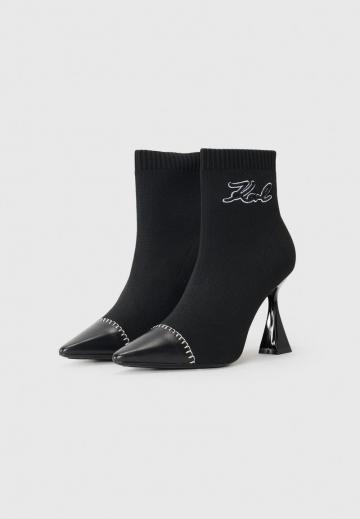 Высокие сапоги