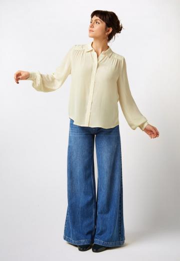 Клешеные джинсы