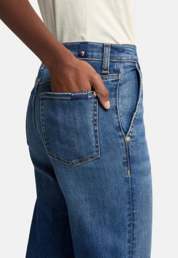 Клешеные джинсы
