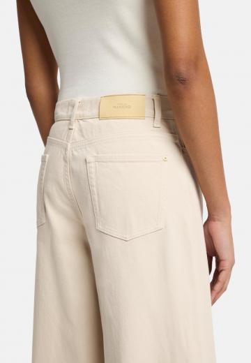 Клешеные джинсы