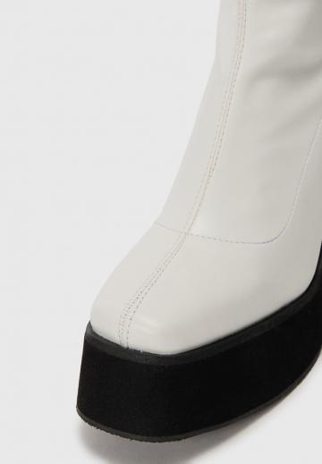 Высокие сапоги