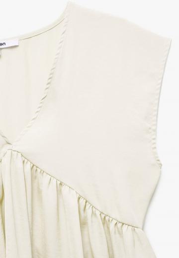 Блузка без рукавов