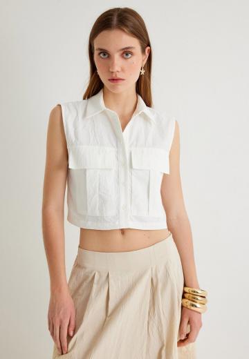 Блузка без рукавов