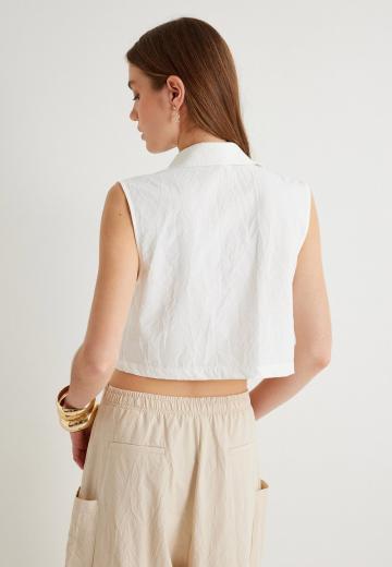 Блузка без рукавов