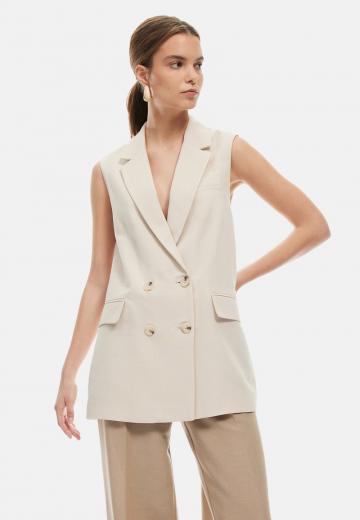 Длинный жилет