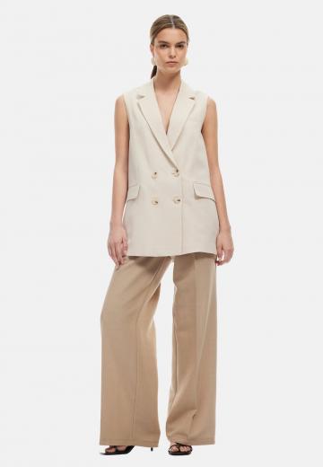 Длинный жилет