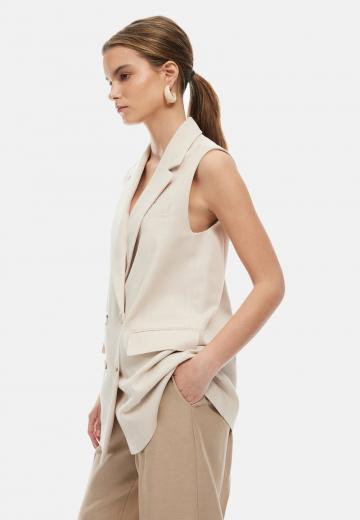 Длинный жилет