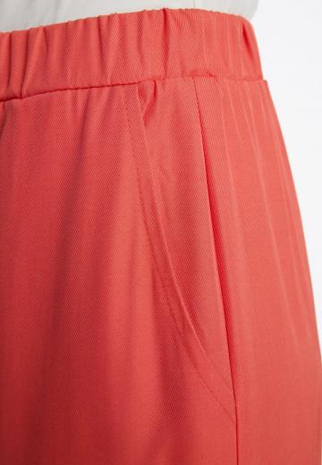 Брюки с накладными карманами