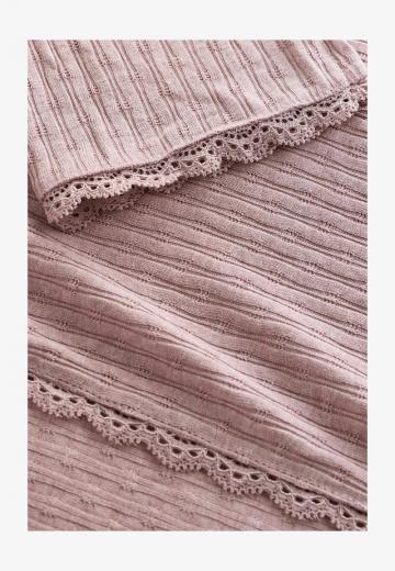 Длинный жилет