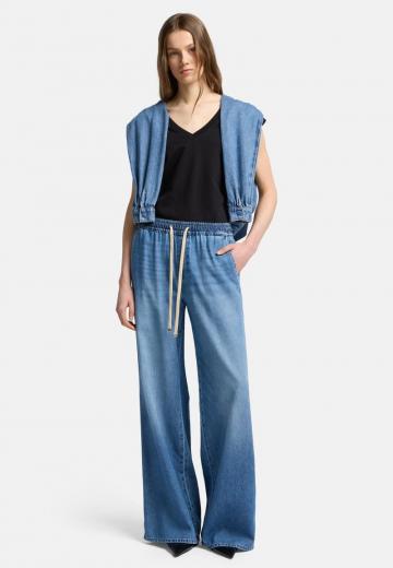 Клешеные джинсы