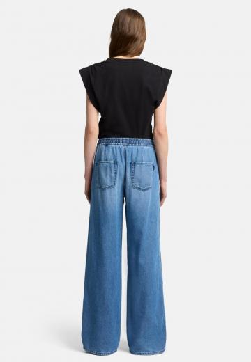 Клешеные джинсы