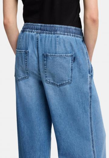 Клешеные джинсы