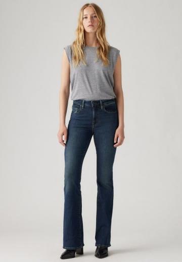 Клешеные джинсы