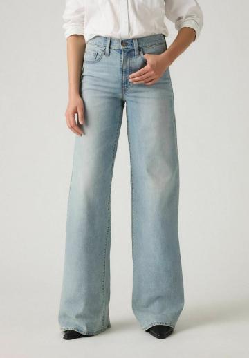Клешеные джинсы